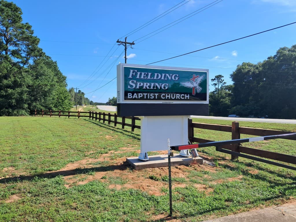 Fielding Spring Baptist Church roadside monument sign on a sunny day